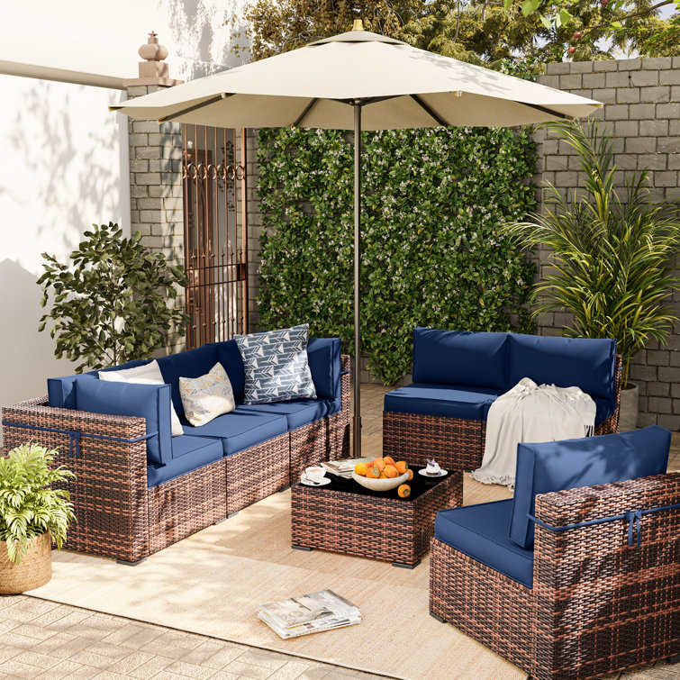 Latitude Run® 7 Piece Rattan Sectional Seating Group with Cushions